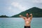 Portrait of a handsome happy man at tropical resort with smile