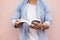 Portrait handsome man holding book .Man standing inside university , reading book and relaxing