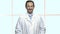 Portrait of handsome mature man in lab coat.