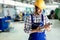 A portrait of handsome metal industry worker in factory