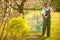 Portrait of a handsome senior man gardening in his garden