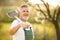 Portrait of a handsome senior man gardening in his garden