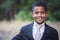 Portrait of a handsome young African American boy in formal clothing