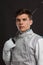 Portrait of Handsome Young male fencer wearing