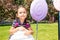 Portrait of happy adorable child girl outdoor. Cute little kid i