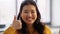 Portrait of happy asian woman showing thumbs up