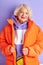 Portrait of happy caucasian elderly woman in stylish wear