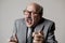 Portrait of happy and cheerful senior mature 60s business man smiling wearing dressing formal necktie looking cheerful and excited