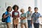 Portrait of happy cheerful smiling diverse schoolchildren in classroom.