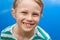 Portrait of happy child next to swimming pool