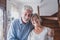 Portrait of happy couple old people seniors hug together, looking at the camera, loving to mature wife and husband with healthy