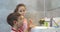 Portrait happy cute young children brushing teeth in bathroom and smiling. Children daily healthcare routine. Caucasian