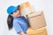 Portrait of happy delivery asian woman her hands holding cardboard box