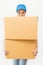 Portrait of happy delivery asian woman her hands holding cardboard box