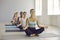 Portrait of happy diverse sporty women do yoga