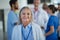 Portrait of happy doctor woman at hospital room.