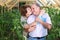 Portrait of happy elderly couple in the greenhouse