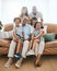 Portrait, happy and family on a sofa, relax and quality time with joy, cheerful and bonding at home. Face, grandparents