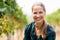 Portrait of happy female vintner