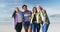 Portrait of happy group of diverse female friends having fun, laughing at the beach