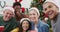 Portrait of happy group of diverse friends looking at camera and smiling