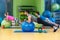 Portrait of happy group exercising on Swiss ball