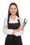 Portrait of happy hairdresser with combs on white background