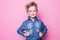 Portrait of happy joyful beautiful little boy. Studio portrait over pink background