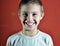 Portrait of happy joyful cute little boy, studio shot