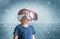 Portrait of happy kid in a virtual reality headset. Attractive kid using vr goggles over abstract background