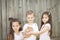 Portrait of happy kids with adorable rabbit