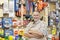 Portrait of a happy mature salesperson with arms crossed in hardware store