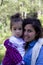 Portrait of happy mother and doughter in the park