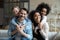 Portrait of happy multiethnic family with diverse kids