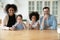 Portrait of happy multiracial family recommend drinking water