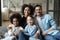 Portrait of happy multiracial family relax at home