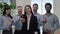 Portrait happy office group diverse multinational business people with corporate team leader show thumbs up gesture at