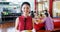 Portrait of happy schoolgirl holding breakfast in plate