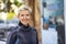 Portrait of a happy scuba diver woman in a wet suit