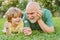 Portrait of happy senior man father smiling and happy cute son. Father and grandfather. Happy family Grandson hugs his