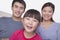 Portrait of happy and smiling family in casual clothing, studio shot, tilt