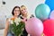 Portrait of happy smiling mom and teenage daughter, birthday celebration