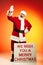 Portrait of happy smiling Santa Claus with greeting sign isolated on red yellow background in neon. Merry Christmas