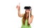 Portrait of happy smiling young beautiful girl getting experience using VR-headset glasses of virtual reality isolated