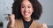 Portrait happy successful afro american woman enthusiastic motivated girl looking at camera shouting with happiness joy