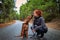 Portrait of happy teenage girl and Rhodesian ridgeback dog . Dog giving girl sweet kiss lick.