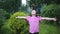 Portrait of happy wet child in rain in garden in hot summer. kids fun outroors on vacation. rainy weather.