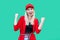 Portrait of happy winner beautiful blond young hipster style woman in red blouse and cap, standing looking at camera and