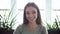 Portrait of happy woman with beautiful smile indoors