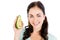 Portrait of happy woman holding avocado